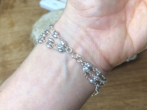 Filigree Butterfly Bracelet with Sleek Grey Pearls and Sterling Silver