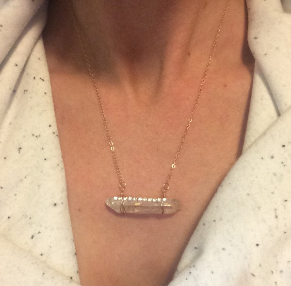 quartz crystal necklace with diamonds on rose gold chain
